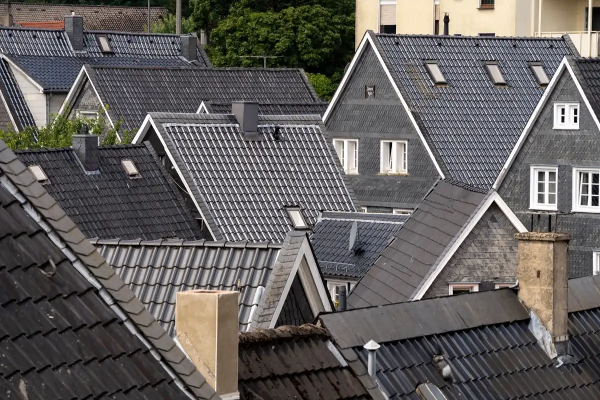 Steep roof eaves and gutter lines on houses in Garland, TX