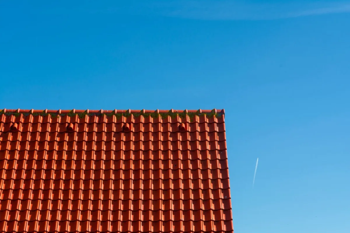 Tile roof gable in full sun, the kind of exposure that sets roof life in Garland, TX